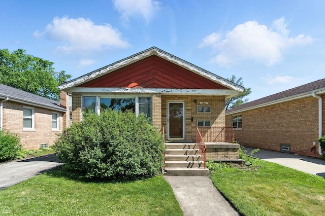 2644 W 94th St, Evergreen Park, IL 60805 - bungalow-style house with brick siding and a front lawn