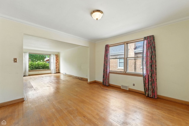 2644 W 94th St, Evergreen Park, IL 60805 - unfurnished room with crown molding and light wood-type flooring