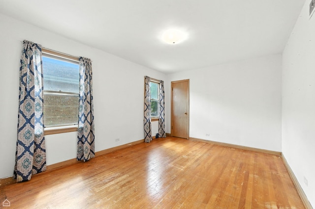 2644 W 94th St, Evergreen Park, IL 60805 - unfurnished room with plenty of natural light and light wood-style flooring