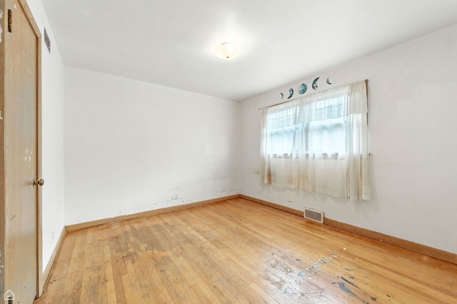 2644 W 94th St, Evergreen Park, IL 60805 - unfurnished room featuring light wood-type flooring and baseboards