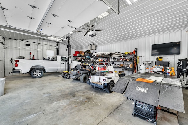2831 E 28th Rd, Marseilles, IL 61341 - garage with a garage door opener and metal wall