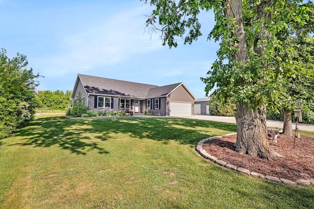 2831 E 28th Rd, Marseilles, IL 61341 - ranch-style home with concrete driveway, a front lawn, roof with shingles, and a garage