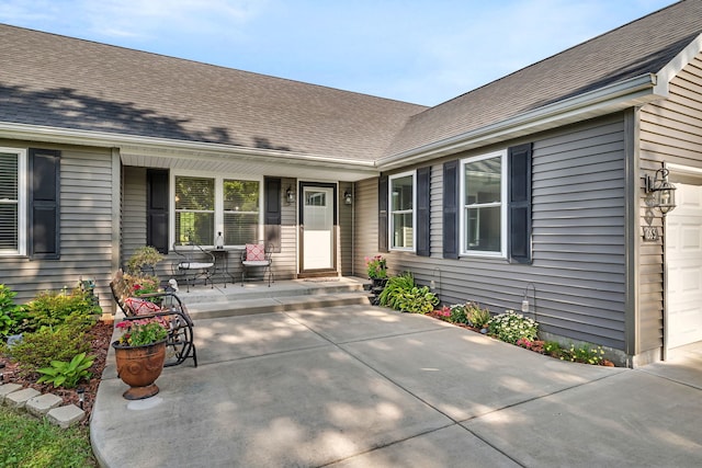 2831 E 28th Rd, Marseilles, IL 61341 - entrance to property with an attached garage and a porch