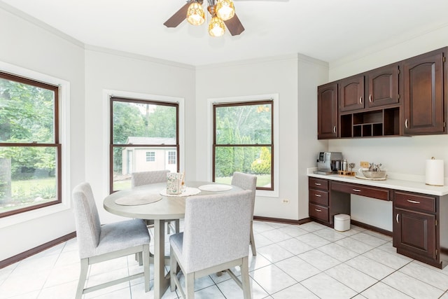 2809 Jenny Jae Ln, Crystal Lake, IL 60012 - dining space featuring built in desk, a ceiling fan, and crown molding