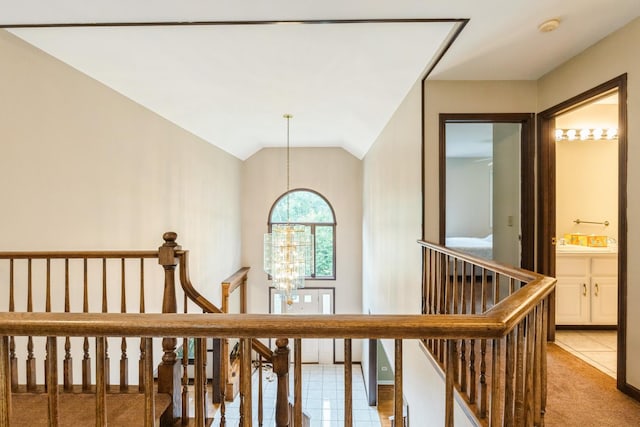 2809 Jenny Jae Ln, Crystal Lake, IL 60012 - hall with an upstairs landing, a chandelier, vaulted ceiling, and light tile patterned floors