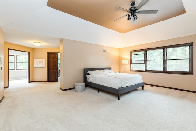 2809 Jenny Jae Ln, Crystal Lake, IL 60012 - bedroom featuring light carpet, a raised ceiling, and a ceiling fan