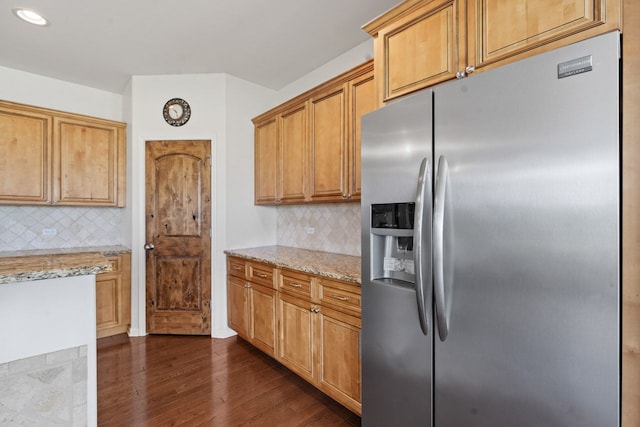 501 Blackstone Ct, Lake Villa, IL 60046 - kitchen with stainless steel fridge, light stone counters, backsplash, dark wood-type flooring, and recessed lighting