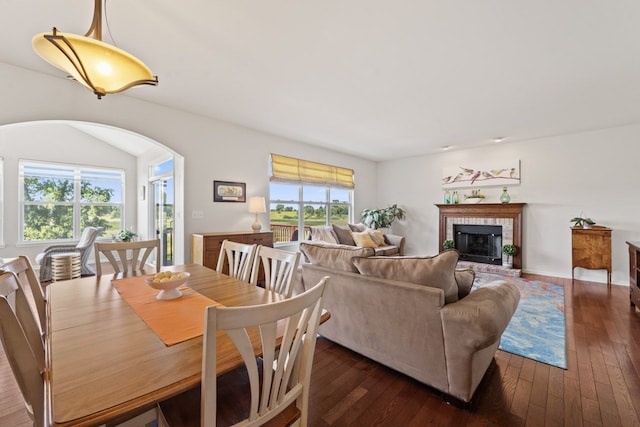 501 Blackstone Ct, Lake Villa, IL 60046 - dining area featuring dark wood finished floors and a brick fireplace