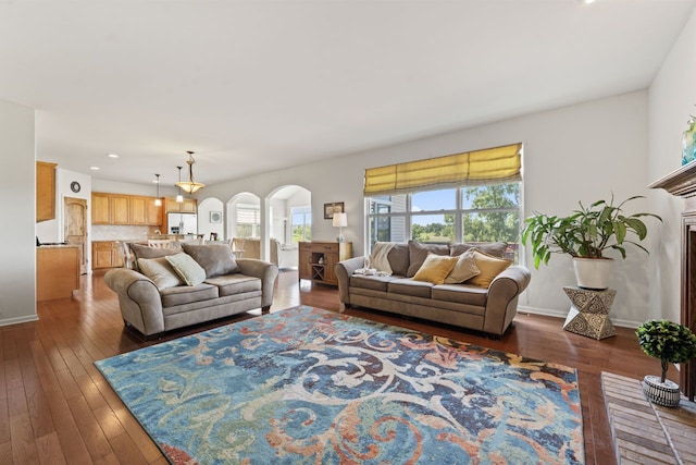 501 Blackstone Ct, Lake Villa, IL 60046 - living room with arched walkways, hardwood / wood-style flooring, and recessed lighting