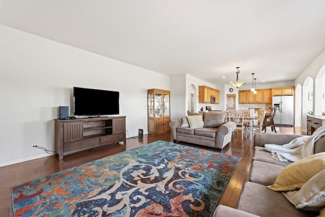 501 Blackstone Ct, Lake Villa, IL 60046 - living room featuring arched walkways, wood-type flooring, and recessed lighting
