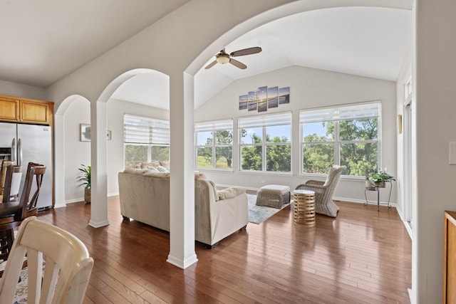 501 Blackstone Ct, Lake Villa, IL 60046 - living area featuring a ceiling fan, wood-type flooring, arched walkways, and vaulted ceiling
