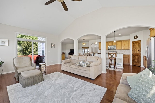 501 Blackstone Ct, Lake Villa, IL 60046 - living room with arched walkways, ceiling fan, lofted ceiling, and dark wood-type flooring
