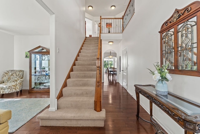 501 Blackstone Ct, Lake Villa, IL 60046 - foyer with arched walkways, stairway, and wood finished floors