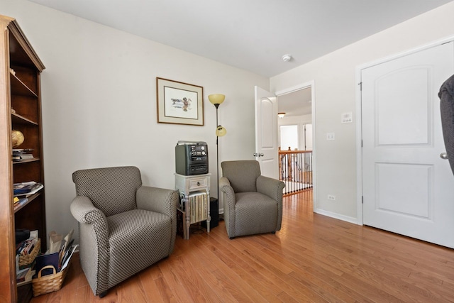 501 Blackstone Ct, Lake Villa, IL 60046 - sitting room featuring wood finished floors and baseboards