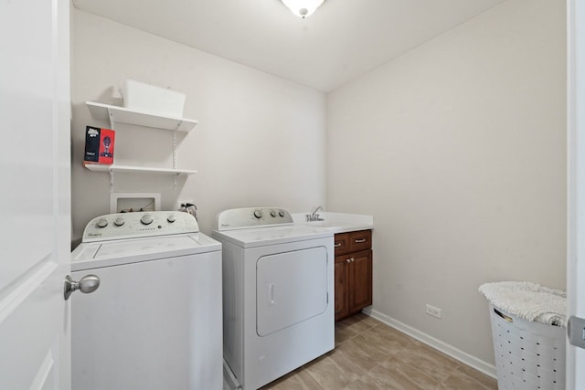 501 Blackstone Ct, Lake Villa, IL 60046 - washroom with cabinet space, washing machine and clothes dryer, and light tile patterned floors