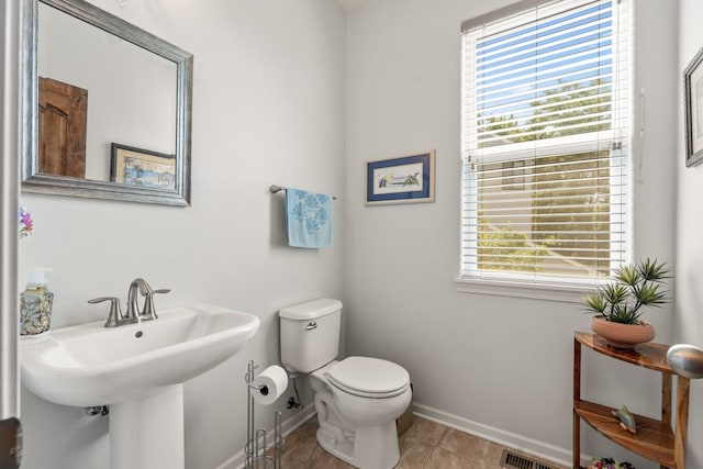 501 Blackstone Ct, Lake Villa, IL 60046 - half bathroom featuring toilet and tile patterned flooring