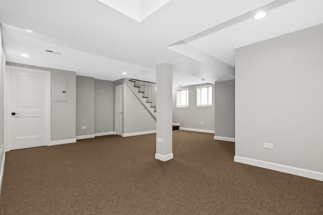 3237 W Sunnyside Ave Unit 1E, Chicago, IL 60625 - basement featuring dark colored carpet, recessed lighting, stairs, and electric panel