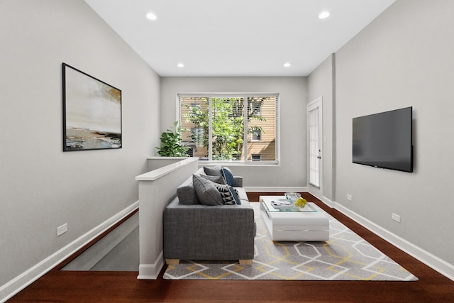 3237 W Sunnyside Ave Unit 1E, Chicago, IL 60625 - living area featuring recessed lighting, wood finished floors, and an upstairs landing
