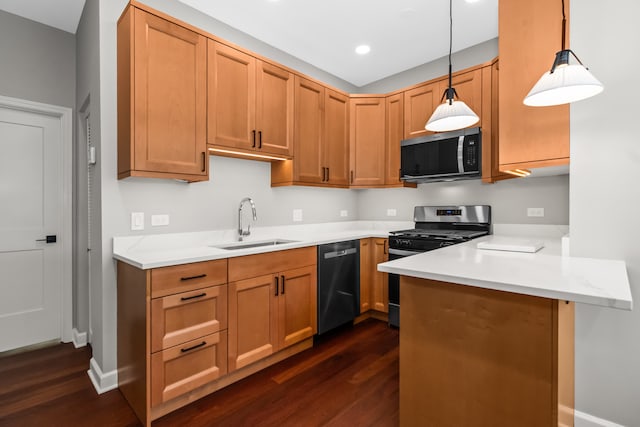 3237 W Sunnyside Ave Unit 1E, Chicago, IL 60625 - kitchen featuring dishwasher, stainless steel gas range oven, dark wood-type flooring, a peninsula, and light countertops