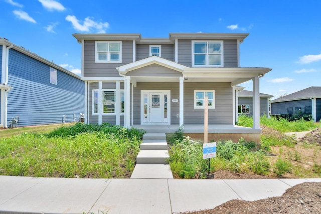 24465 S St Peters Dr, Channahon, IL 60410 - view of front of home with a porch