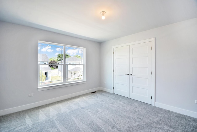 24465 S St Peters Dr, Channahon, IL 60410 - unfurnished bedroom featuring carpet floors and a closet