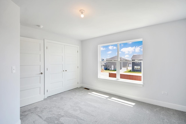 24465 S St Peters Dr, Channahon, IL 60410 - unfurnished bedroom featuring carpet and a closet