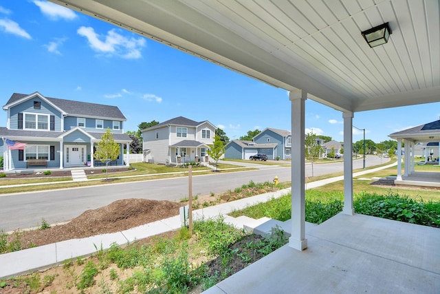 24465 S St Peters Dr, Channahon, IL 60410 - view of yard featuring covered porch and a residential view