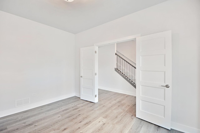 24465 S St Peters Dr, Channahon, IL 60410 - spare room featuring light wood-type flooring and baseboards