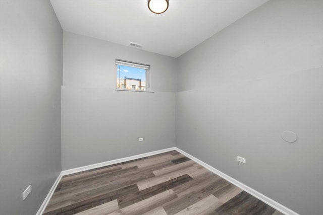 6139 S King Dr, Chicago, IL 60637 - empty room with baseboards and wood finished floors