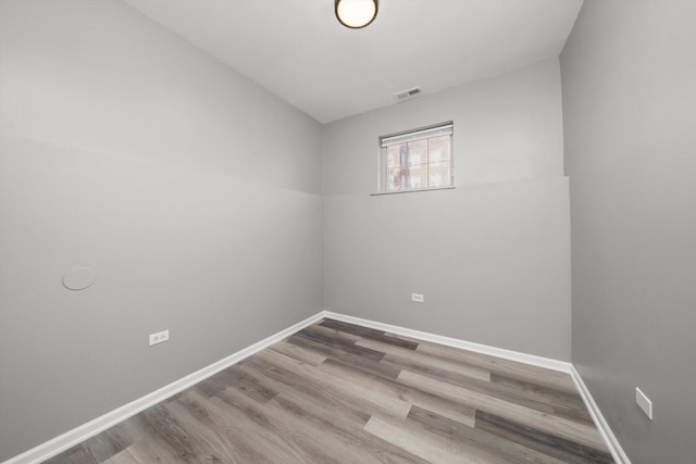 6139 S King Dr, Chicago, IL 60637 - unfurnished room featuring wood finished floors and baseboards