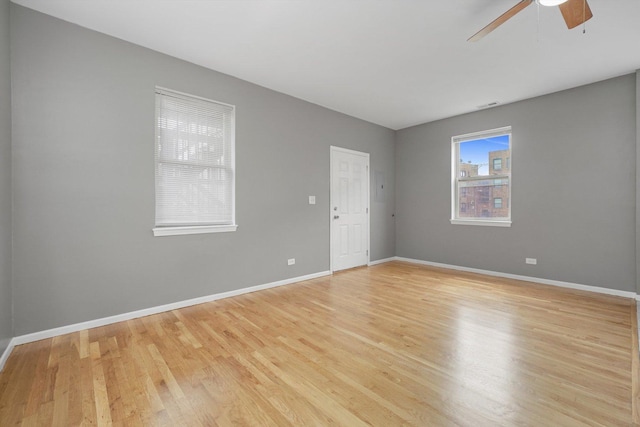 6139 S King Dr, Chicago, IL 60637 - unfurnished room with light wood finished floors and a ceiling fan