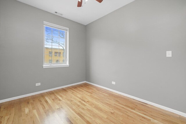 6139 S King Dr, Chicago, IL 60637 - empty room with a ceiling fan and light wood finished floors