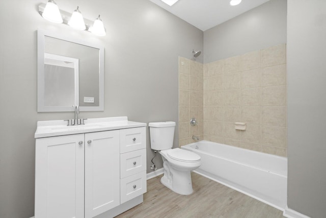 6139 S King Dr, Chicago, IL 60637 - full bath featuring vanity, wood finished floors, and bathing tub / shower combination