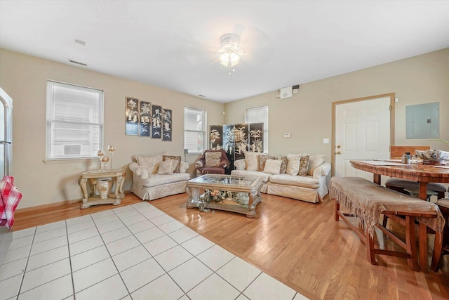 6139 S King Dr, Chicago, IL 60637 - living area with electric panel, ceiling fan, and light tile patterned floors