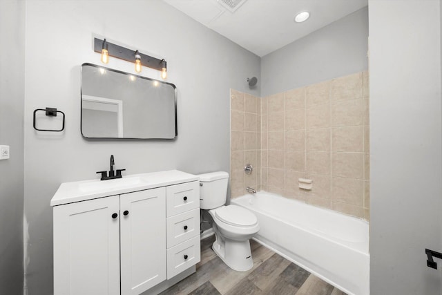 6139 S King Dr, Chicago, IL 60637 - full bathroom with vanity, wood finished floors, and shower / tub combination