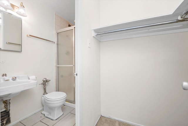 1450 E 55th Pl Unit 317S, Chicago, IL 60637 - bathroom with a stall shower and toilet