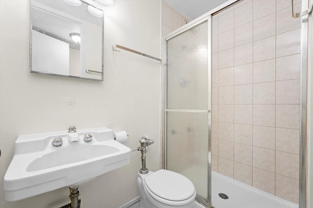 1450 E 55th Pl Unit 317S, Chicago, IL 60637 - full bathroom featuring a stall shower and toilet