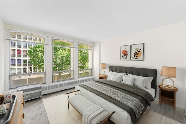 1450 E 55th Pl Unit 317S, Chicago, IL 60637 - carpeted bedroom featuring radiator