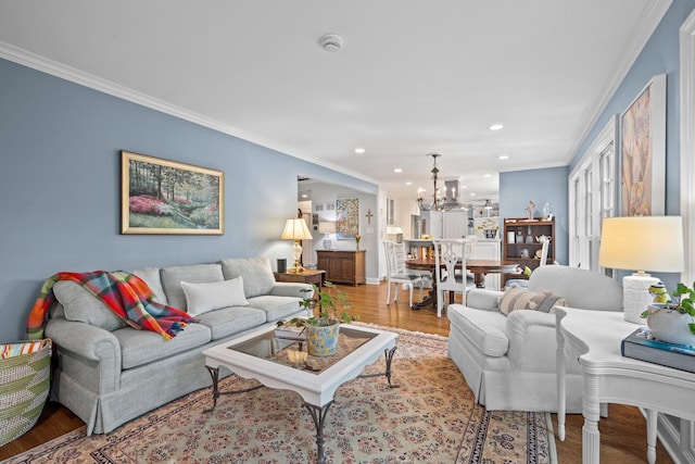 95 Warrington Dr, Lake Bluff, IL 60044 - living area featuring a chandelier, ornamental molding, wood finished floors, and recessed lighting