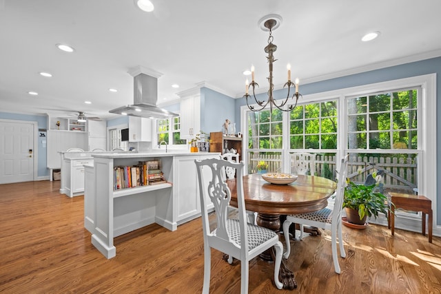 95 Warrington Dr, Lake Bluff, IL 60044 - dining room with crown molding, a ceiling fan, a chandelier, light wood finished floors, and recessed lighting