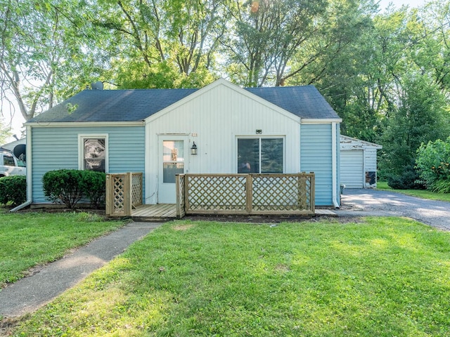 218 Chestnut St, Earlville, IL 60518 - bungalow-style house with a front yard, roof with shingles, and a chimney