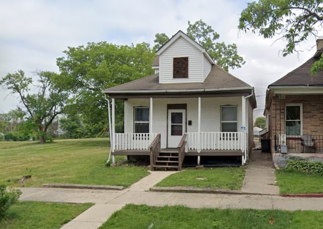 1613 Hanover St, Chicago Heights, IL 60411 - view of front of house featuring covered porch and a front lawn