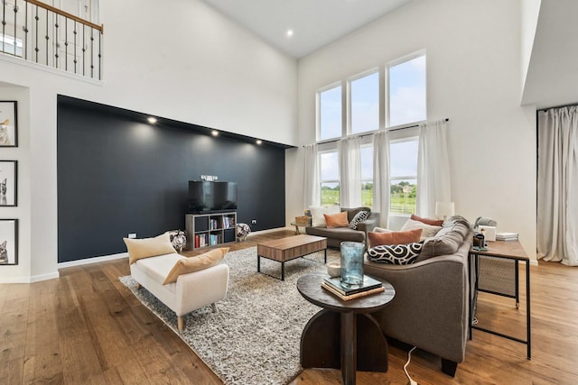 940 Treeline Dr, Algonquin, IL 60102 - living room featuring a high ceiling and wood finished floors