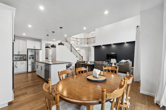 940 Treeline Dr, Algonquin, IL 60102 - dining room featuring stairway, wood finished floors, and recessed lighting