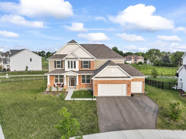 940 Treeline Dr, Algonquin, IL 60102 - view of front of house with brick siding, an attached garage, asphalt driveway, and a shingled roof