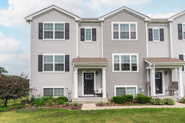 2551 Bella Dr, Pingree Grove, IL 60140 - view of front facade featuring a front yard
