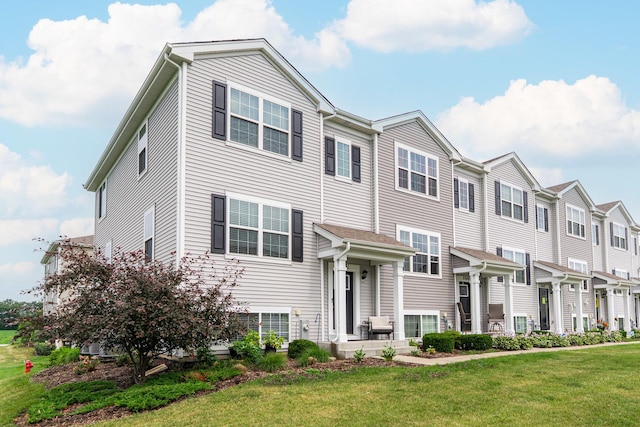 2551 Bella Dr, Pingree Grove, IL 60140 - traditional-style home with a front lawn and a residential view