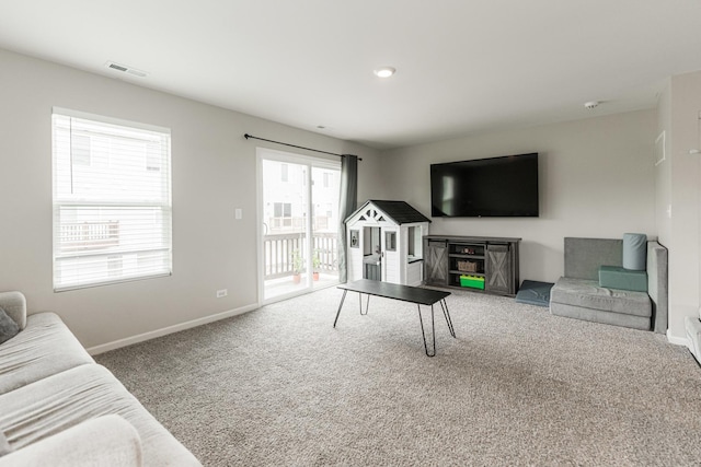 2551 Bella Dr, Pingree Grove, IL 60140 - living room featuring carpet flooring and baseboards