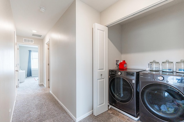 2551 Bella Dr, Pingree Grove, IL 60140 - laundry area with washing machine and dryer and carpet flooring