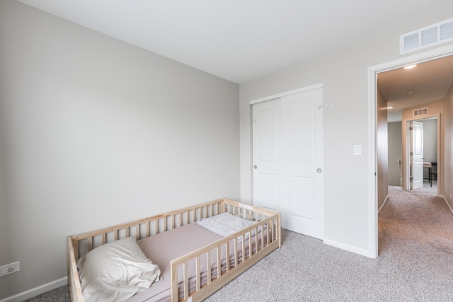 2551 Bella Dr, Pingree Grove, IL 60140 - carpeted bedroom with baseboards and a closet